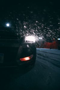 Preview wallpaper car, headlights, rear view, snow, night