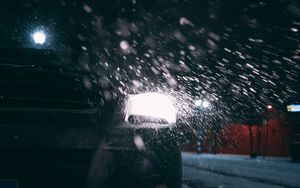 Preview wallpaper car, headlights, rear view, snow, night