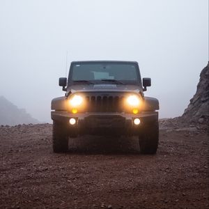 Preview wallpaper car, jeep, suv, black, rain