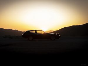 Preview wallpaper car, mountains, silhouettes, sunset, dark