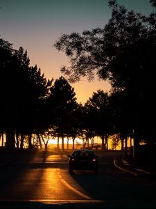 Preview wallpaper car, night, road, trees, shadow