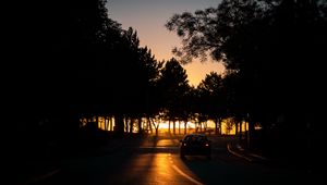 Preview wallpaper car, night, road, trees, shadow