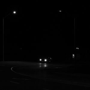 Preview wallpaper car, night, road, black, glow, headlights