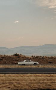 Preview wallpaper car, old, white, road, desert