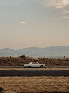 Preview wallpaper car, old, white, road, desert