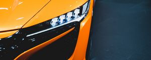 Preview wallpaper car, orange, headlight, light, backlight