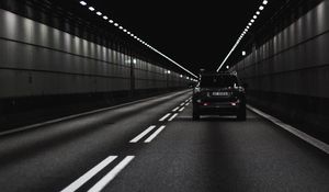 Preview wallpaper car, rear view, bw, tunnel, marking