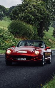 Preview wallpaper car, red, convertible, road, greenery