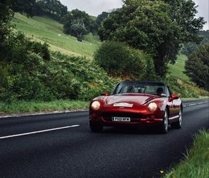 Preview wallpaper car, red, convertible, road, greenery