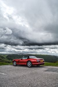 Preview wallpaper car, red, convertible, parking, nature