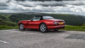 Preview wallpaper car, red, convertible, parking, nature