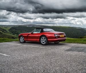 Preview wallpaper car, red, convertible, parking, nature