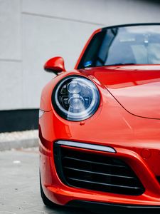 Preview wallpaper car, red, front view, headlight, closeup