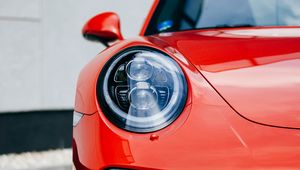 Preview wallpaper car, red, front view, headlight, closeup