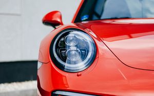 Preview wallpaper car, red, front view, headlight, closeup