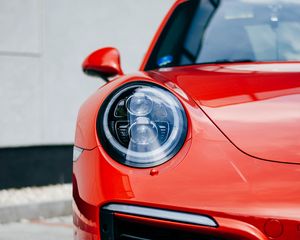 Preview wallpaper car, red, front view, headlight, closeup
