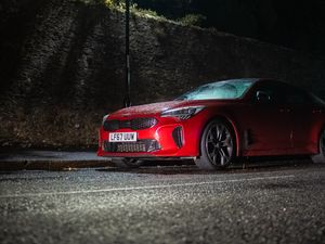 Preview wallpaper car, red, night, lantern, light