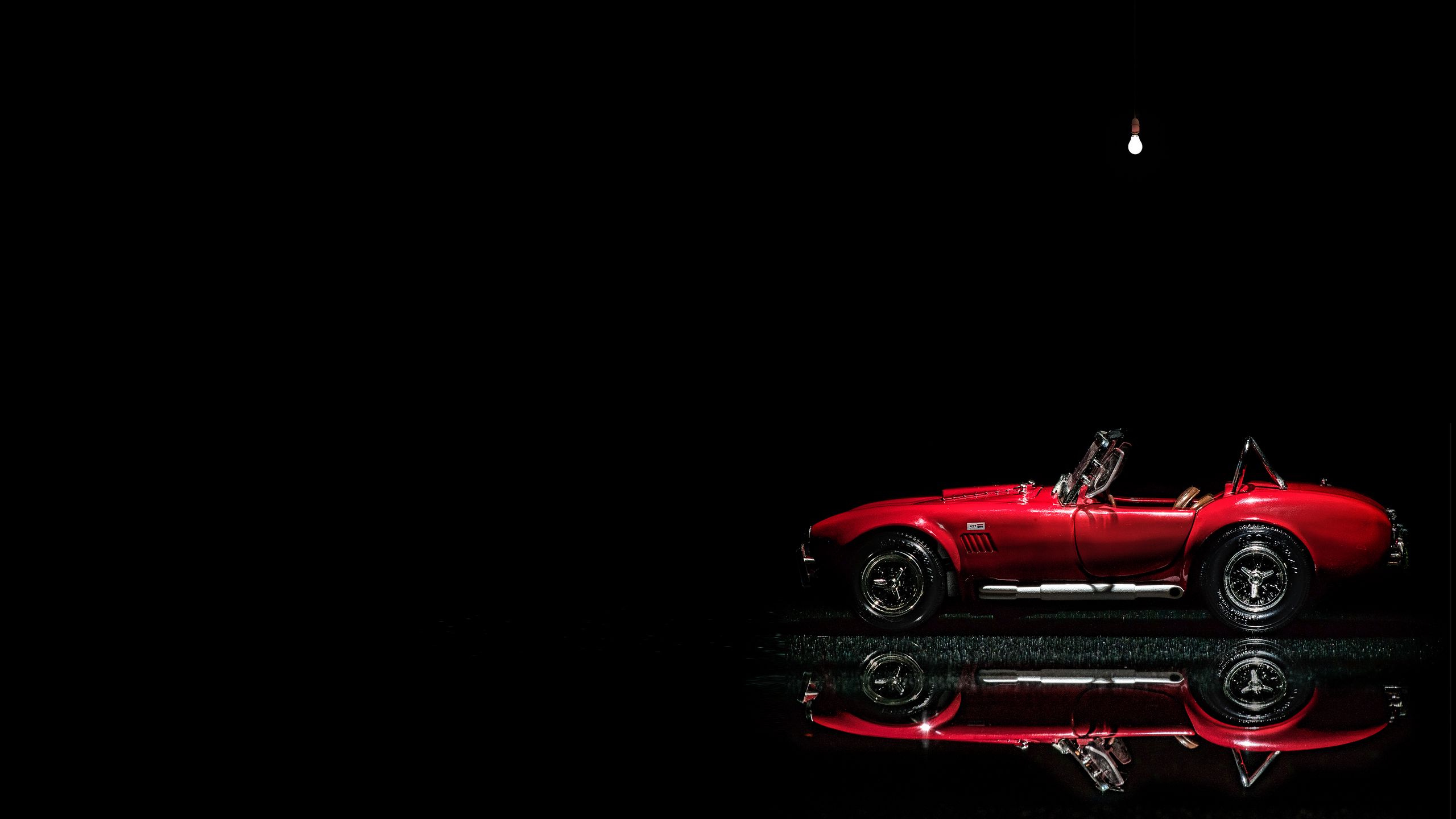 Download wallpaper 2560x1440 car, red, retro, toy, reflection, dark