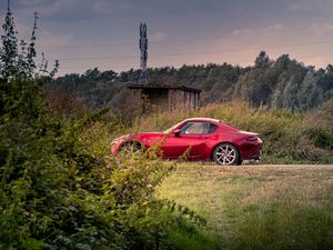 Preview wallpaper car, red, trees, nature