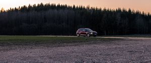 Preview wallpaper car, red, trees, forest