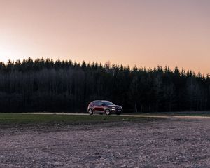 Preview wallpaper car, red, trees, forest