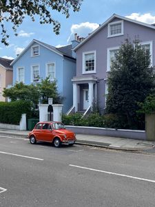 Preview wallpaper car, retro, building, road, street