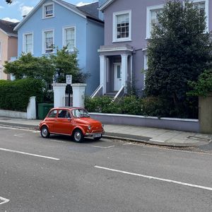 Preview wallpaper car, retro, building, road, street