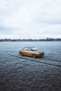 Preview wallpaper car, retro, old, yellow, field