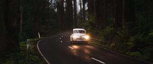 Preview wallpaper car, retro, road, trees, headlights, glow