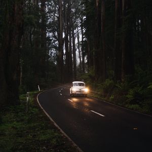 Preview wallpaper car, retro, road, trees, headlights, glow