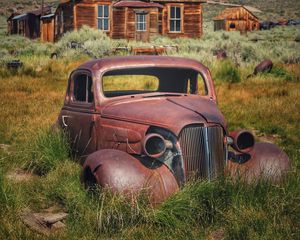 Preview wallpaper car, retro, rust, grass, house, village