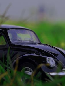 Preview wallpaper car, retro, typewriter, toy, grass