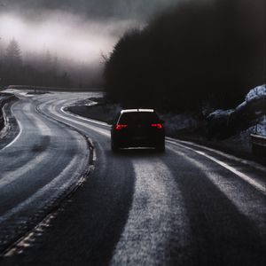 Preview wallpaper car, road, fog, dusk