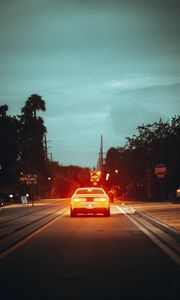 Preview wallpaper car, road, light, dusk, street