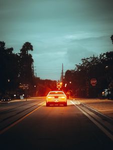 Preview wallpaper car, road, light, dusk, street