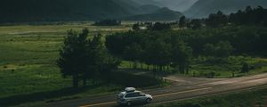 Preview wallpaper car, road, mountains, travel, suv