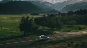 Preview wallpaper car, road, mountains, travel, suv
