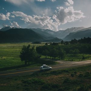 Preview wallpaper car, road, mountains, travel, suv