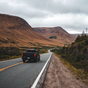 Preview wallpaper car, road, mountains, marking, distance