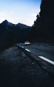 Preview wallpaper car, road, mountains, rocks, marking