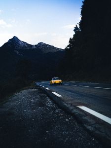 Preview wallpaper car, road, mountains, rocks, marking