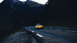 Preview wallpaper car, road, mountains, rocks, marking