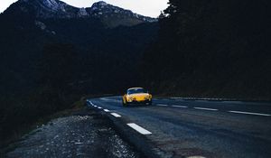 Preview wallpaper car, road, mountains, rocks, marking