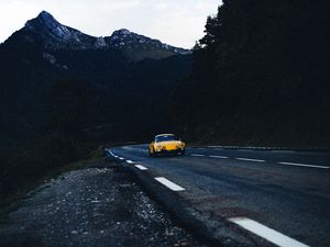 Preview wallpaper car, road, mountains, rocks, marking