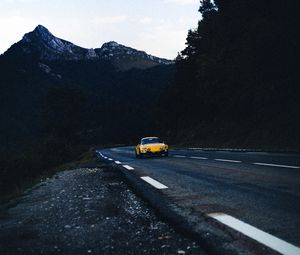 Preview wallpaper car, road, mountains, rocks, marking