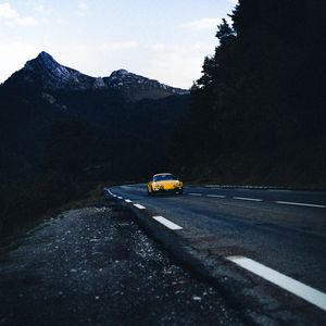 Preview wallpaper car, road, mountains, rocks, marking