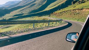 Preview wallpaper car, road, mountains, valley, travel