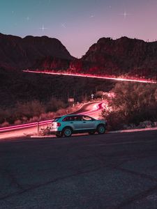 Preview wallpaper car, road, night, starry sky, hill