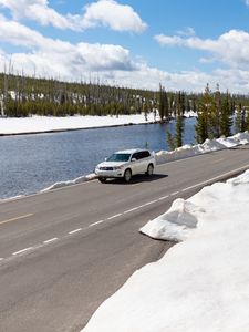 Preview wallpaper car, road, river, snow, white