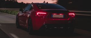Preview wallpaper car, road, speed, dusk, red